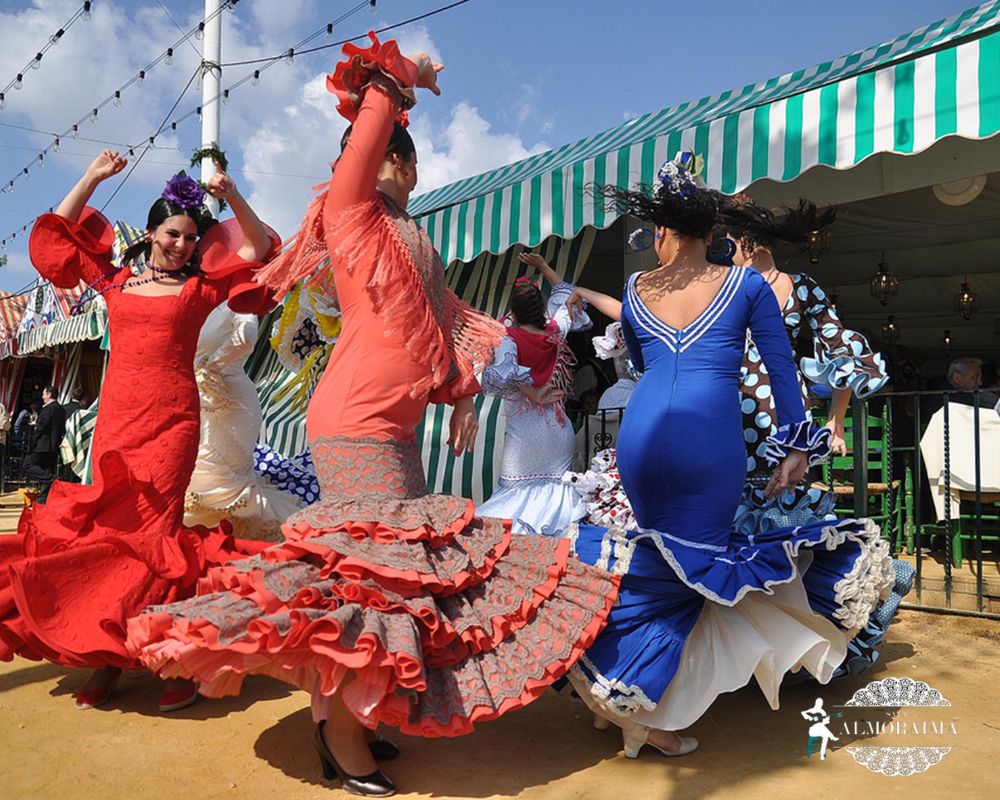 Mujeres bailando flamenco en la Feria de Abril en Sevilla